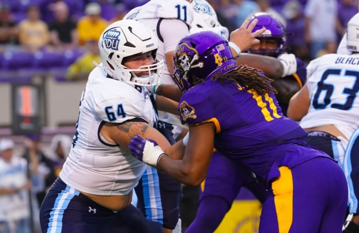 Sep 10, 2022; Old Dominion Monarchs offensive lineman Nick Saldiveri (64) blocks East Carolina Pirates linebacker Jeremy Lewis (11). Mandatory Credit: James Guillory-USA TODAY